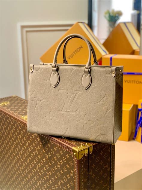 louis vuitton tasje rubber beige|Louis Vuitton designer tote bag.